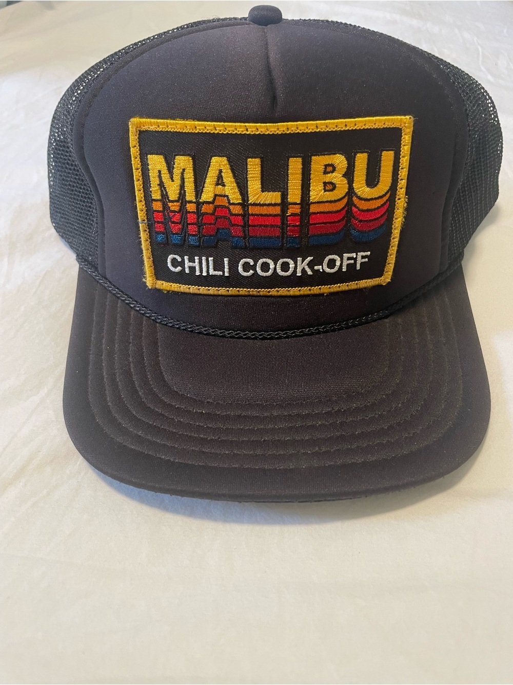 Aviator Nation Black Trucker Hat with Yellow, Red and Blue Patch